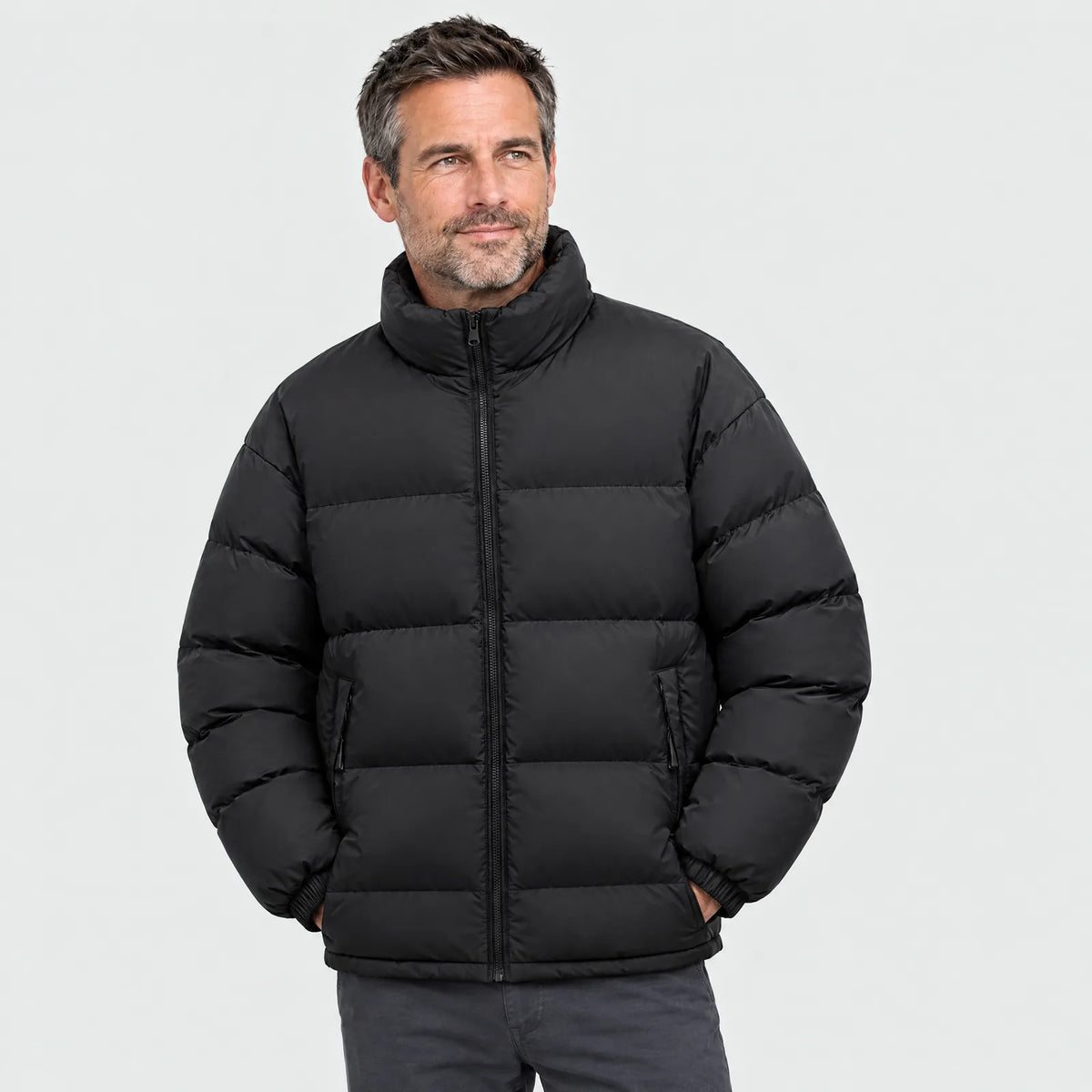 Man wearing the black heated puffer jacket, front view